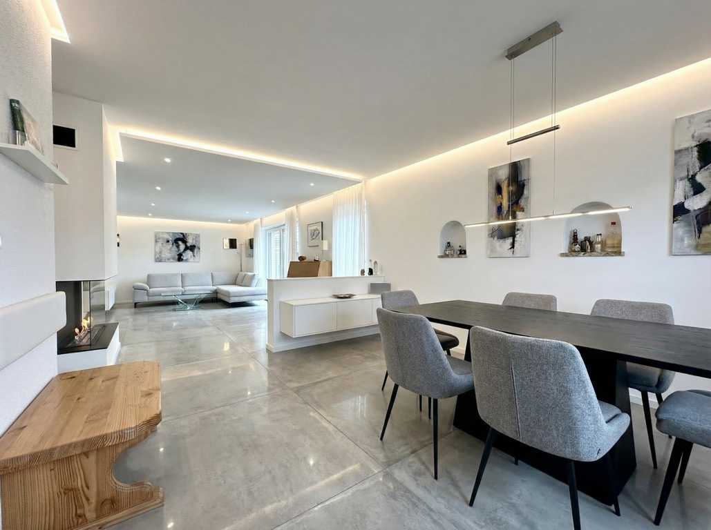 Visualisierung Einfamilienhaus Kaufering Wohnzimmer mit Sitzecke